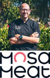 Robert Jones with Mosa Meat logo